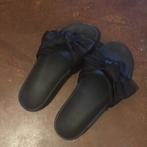 Black slides with bows. Size 8.